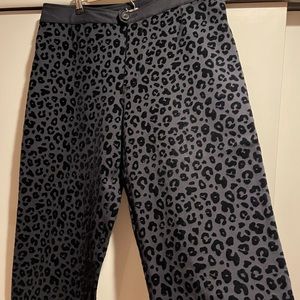 Anthropologie plus 16W Black ankle pants textured with velvet animal print.